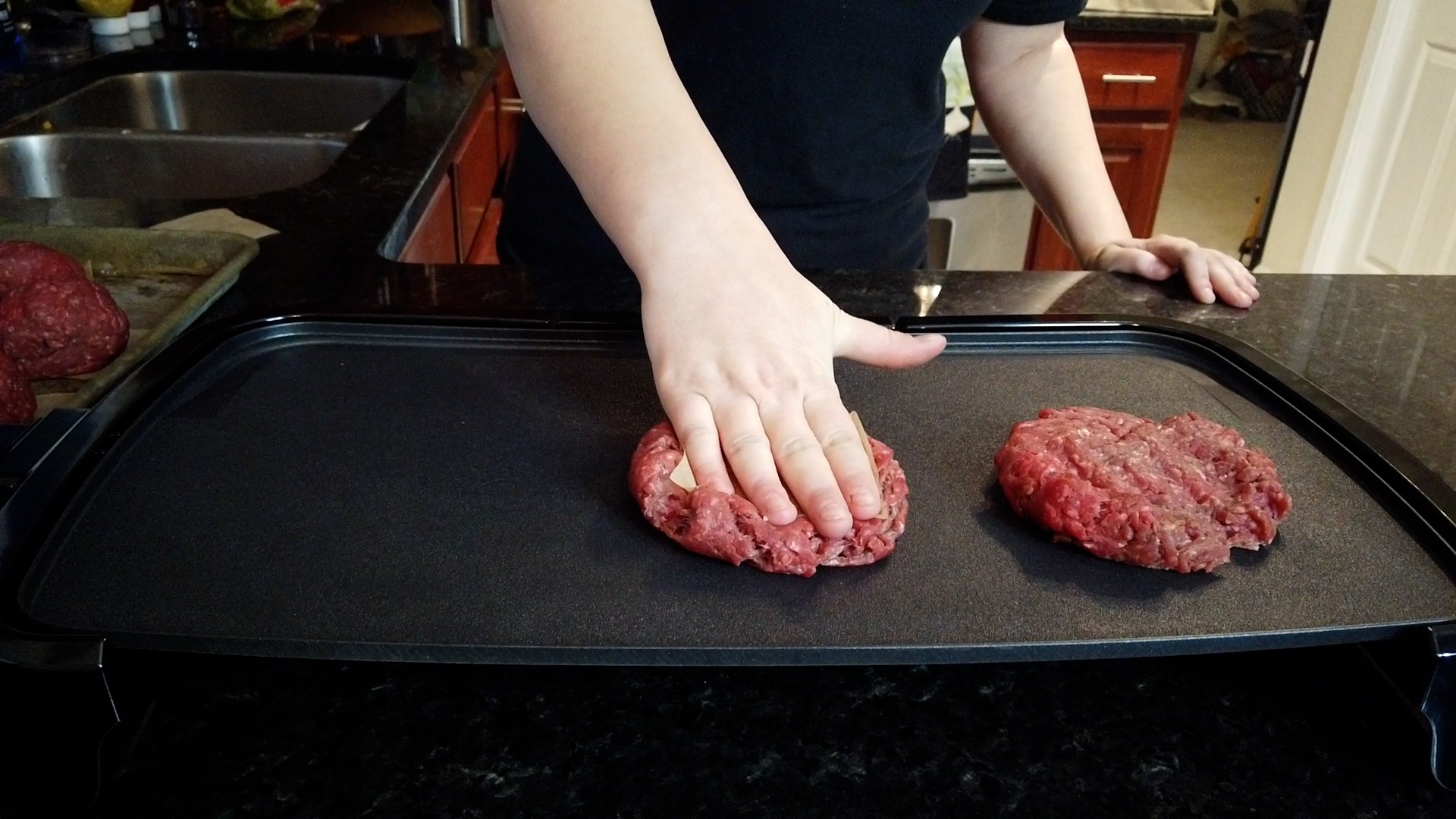 smash burger on griddle